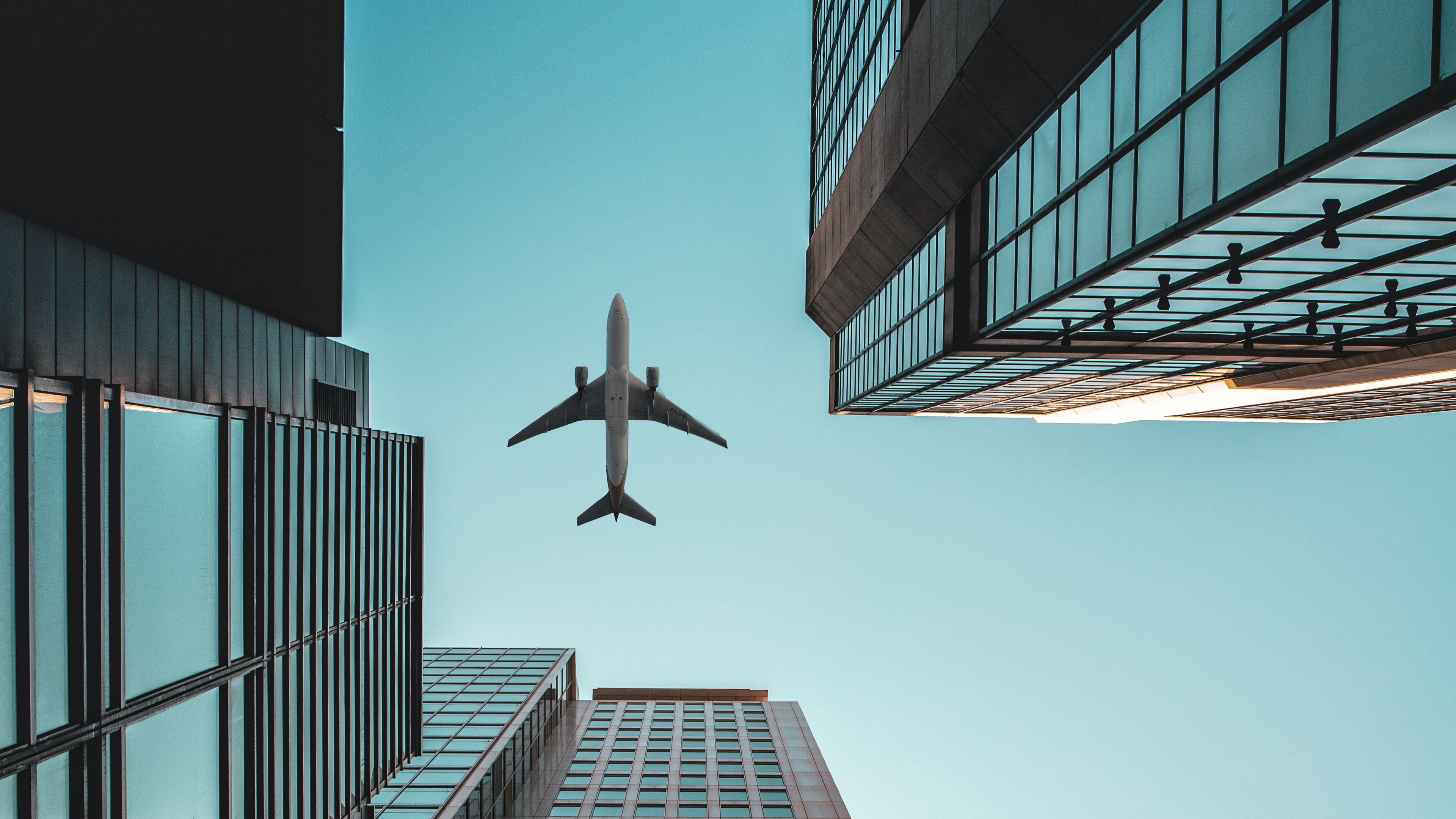 5f518f206cc36_buildings_airplane_skyscra